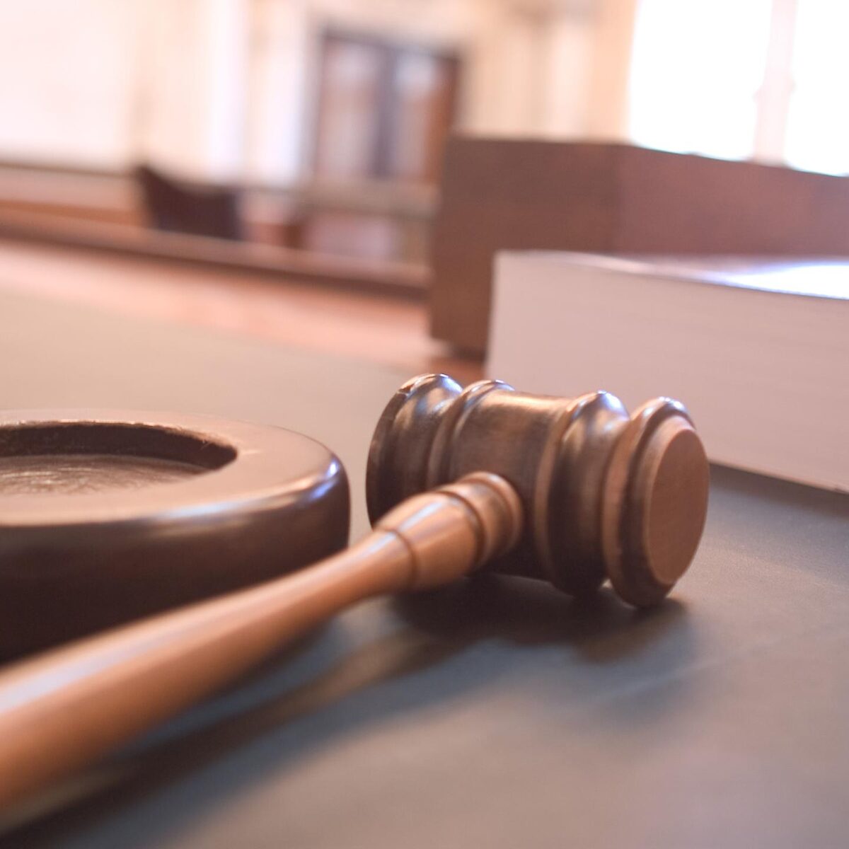 Person reviewing a civil complaint and collection notice at home